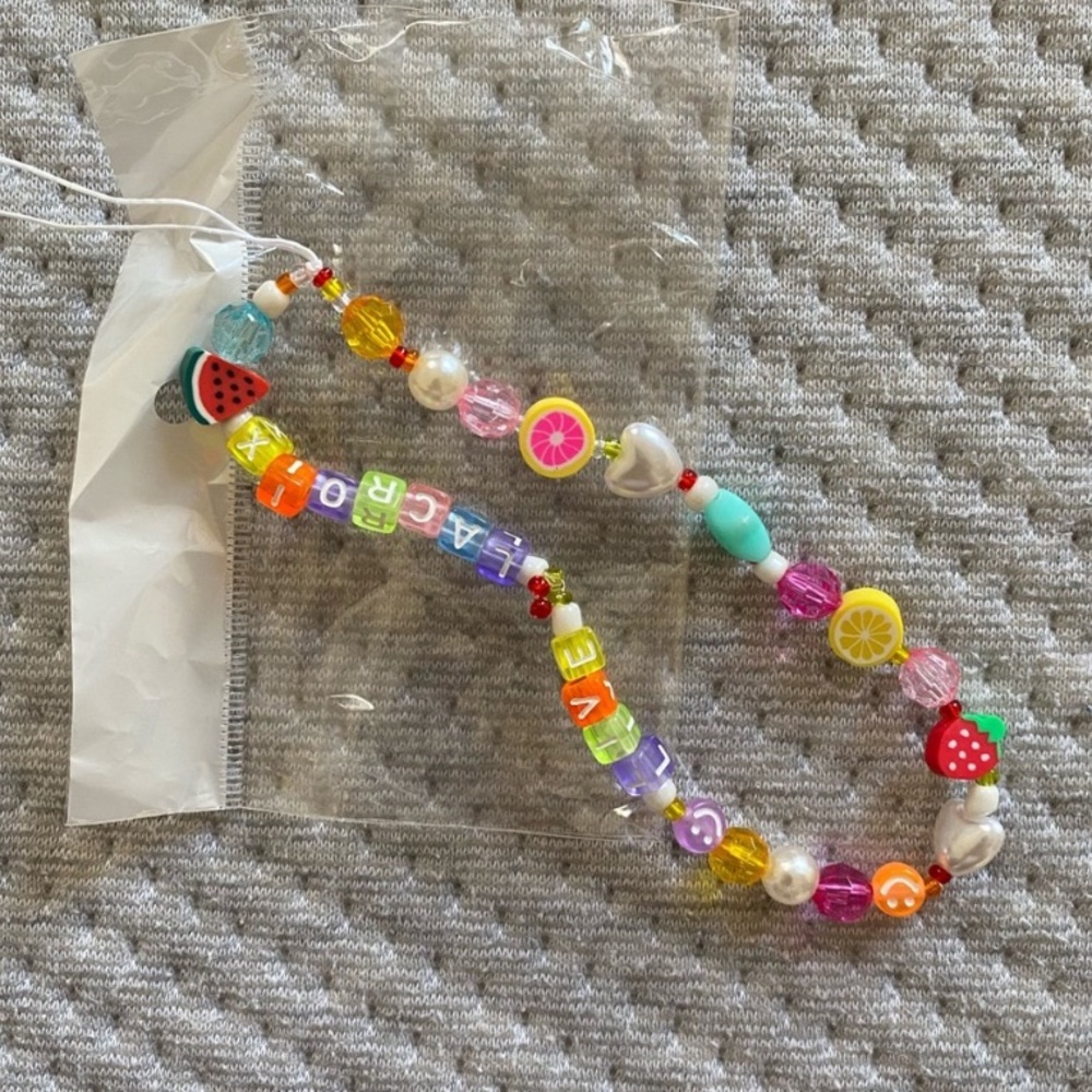 LACROIX PHONE CHARM NEW